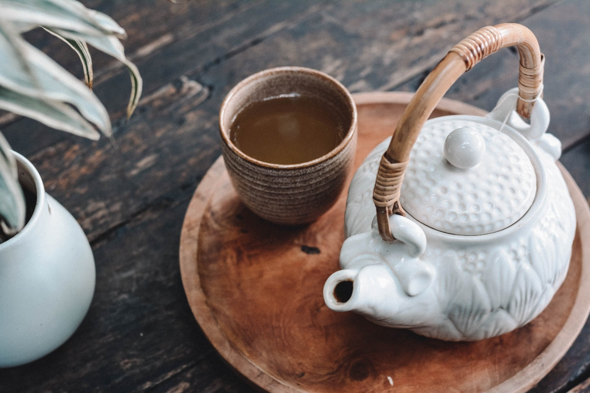 Brewing Japanese green tea and tea pot on tray